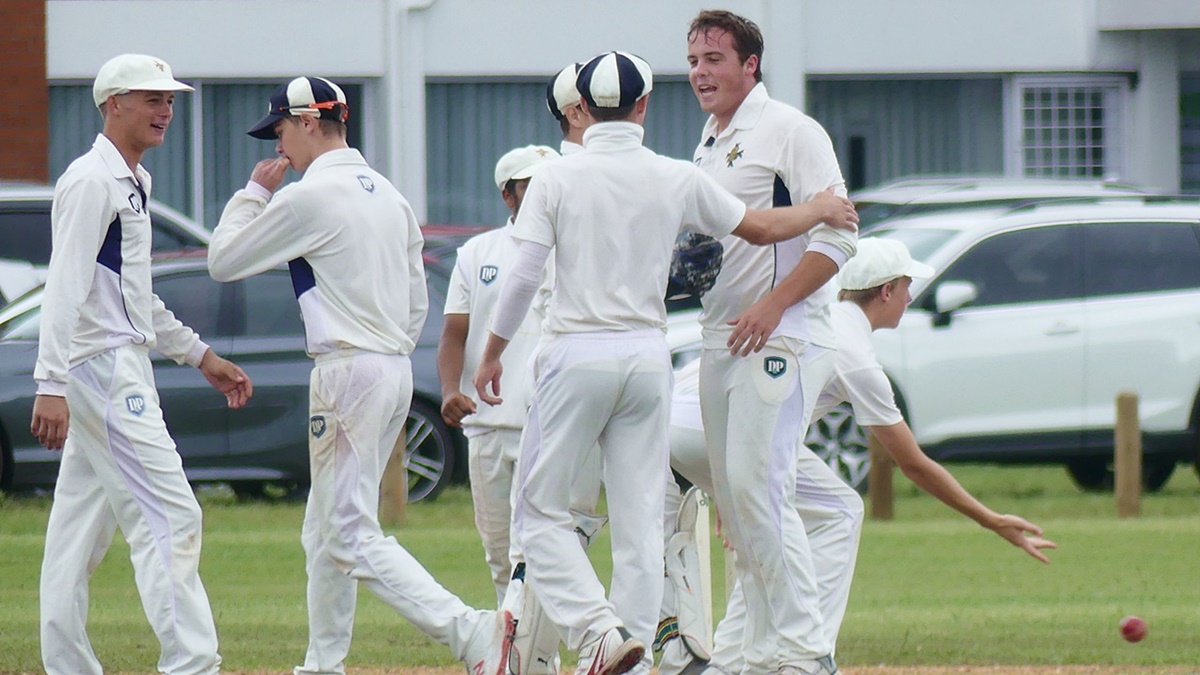 Basil van der Spuy (receiving congratulations), put the DHS batsmen through the ringer. (Photo: Brad Morgan)