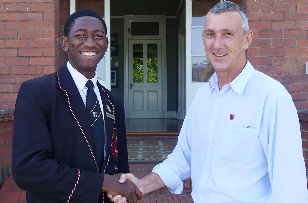 Photographed outside Founder’s House at Clifton College, first team basketball captain Jacques Mahanga and Master in Charge of Basketball Peter Farquharson (Photo: Brad Morgan)