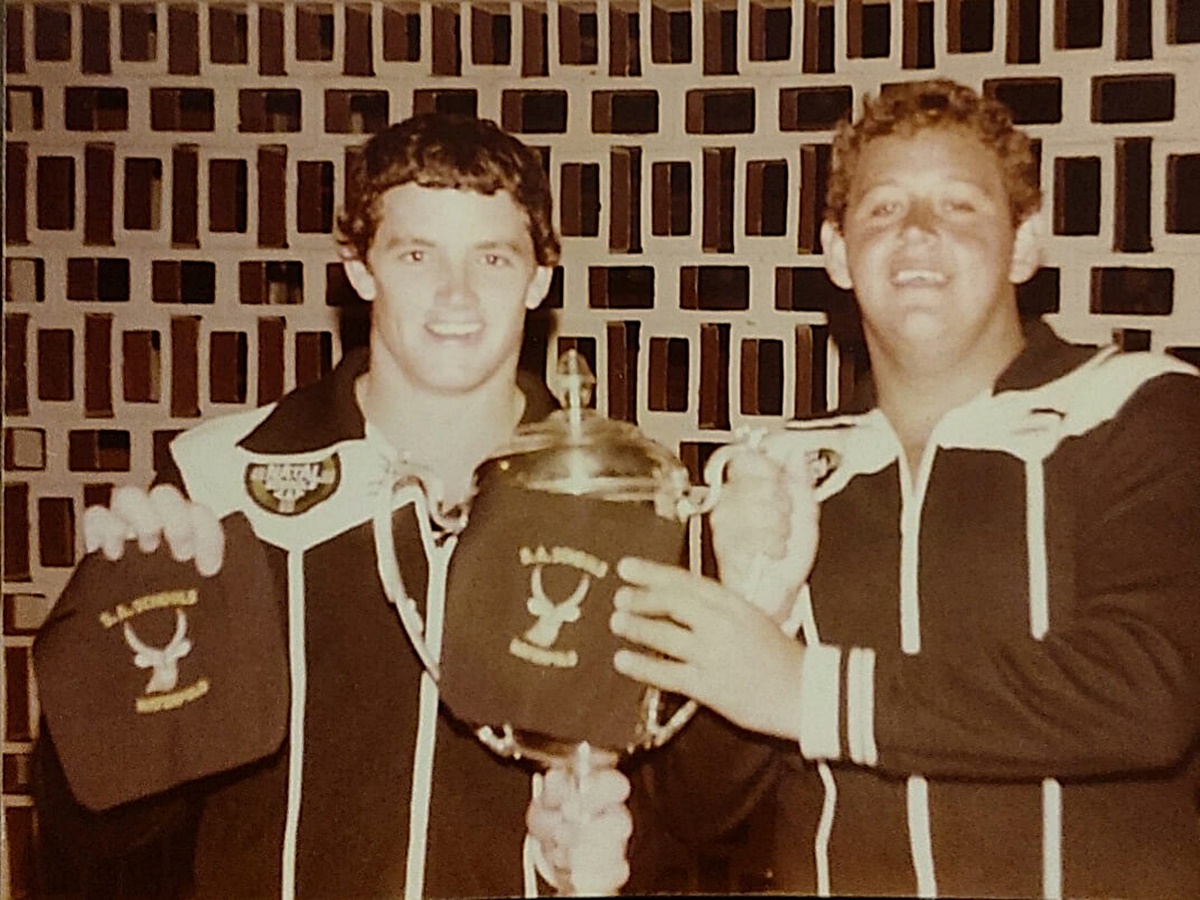 Andrew Shedlock and Steve La Marque proudly show off their South African Schools waterpolo colours.