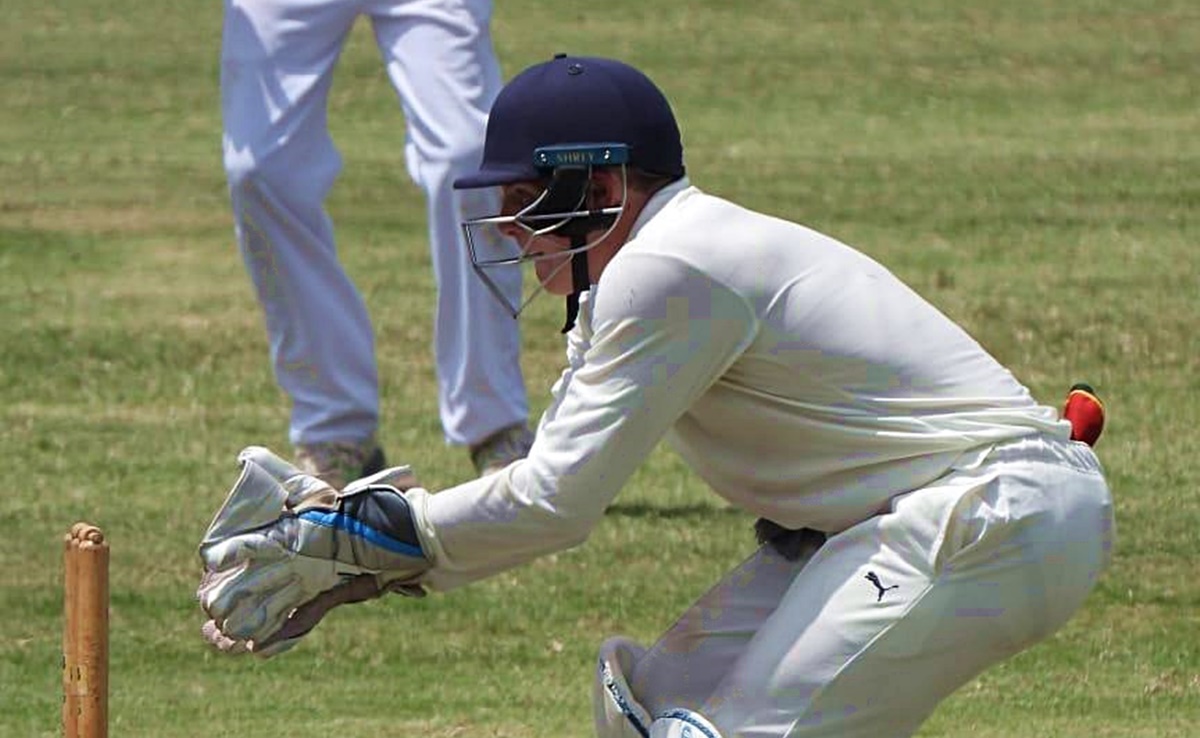 Glenwood 1st XI captain leads his team from behind the stumps.