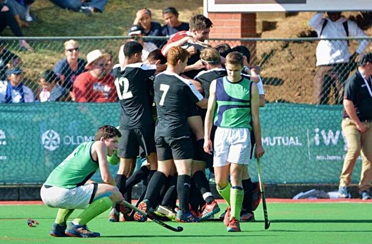 A tale of two teams: the victorious KZN Coastal team celebrates after defeating their rivals, KZN Inland, in the final of the Under-18 Interprovincial Tournament in Pietermaritzburg in 2018.