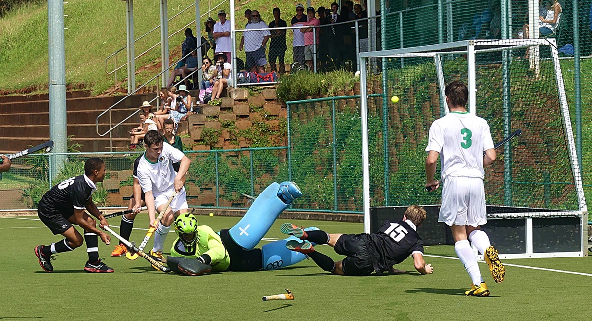 Hilton College scored the opening goal as their striker knocked the ball past a despairing dive from the Glenwood goalkeeper. (Photo: Brad Morgan)