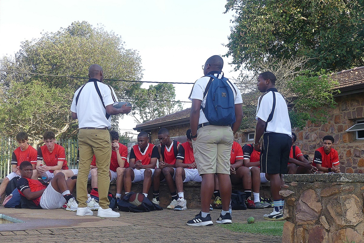 Tired, but triumphant, the Clifton 1st team and coaches reflect on their victory over Kingswood. (Photo: Brad Morgan)