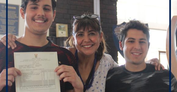 Daniel Kreuzer, his mother Razina, and brother Mikail, celebrate Daniel bagging nine distinctions in the 2022 matric final exams.