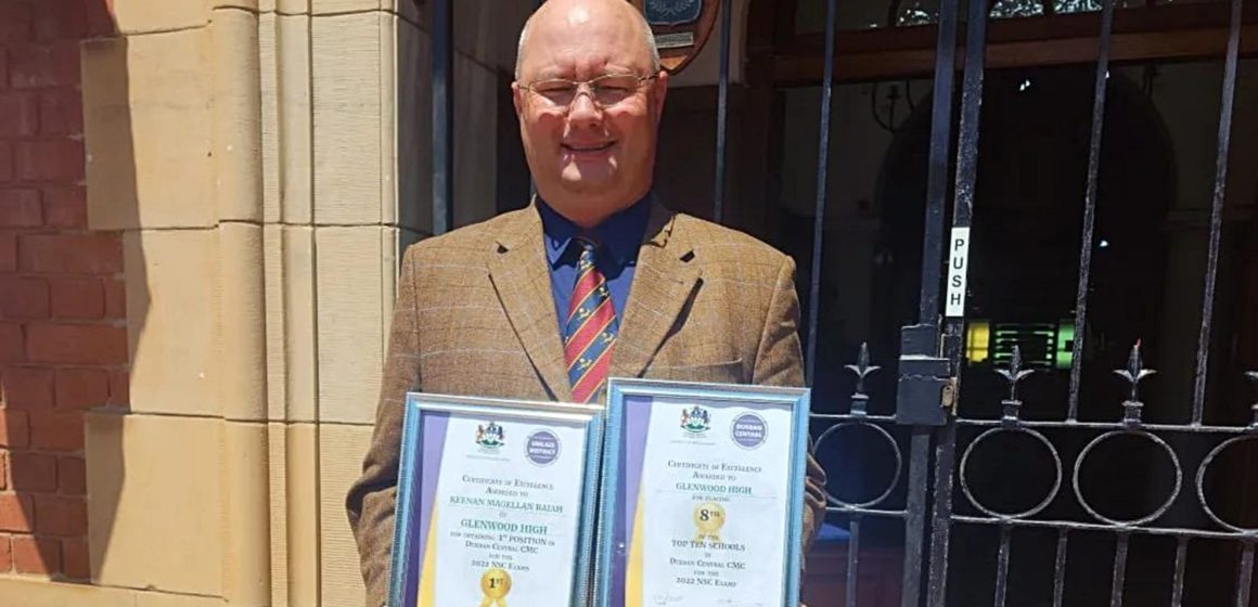 Morné Scott, Glenwood's Deputy Headmaster in charge of Academics, with certificates presented to the school by the Umlazi District for its strong results in the 2022 matric final exams.