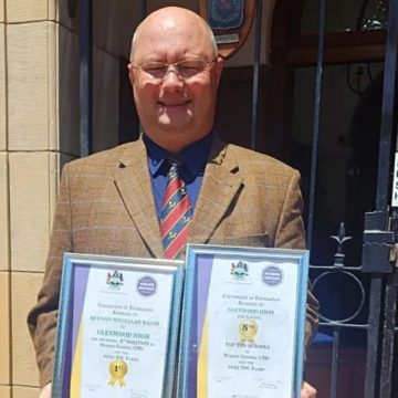 Morné Scott, Glenwood's Deputy Headmaster in charge of Academics, with certificates presented to the school by the Umlazi District for its strong results in the 2022 matric final exams.