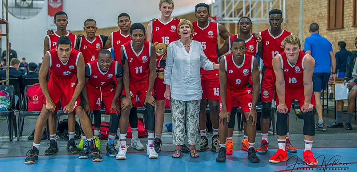 The Maritzburg College basketball 1st team with Jenni Orchard.