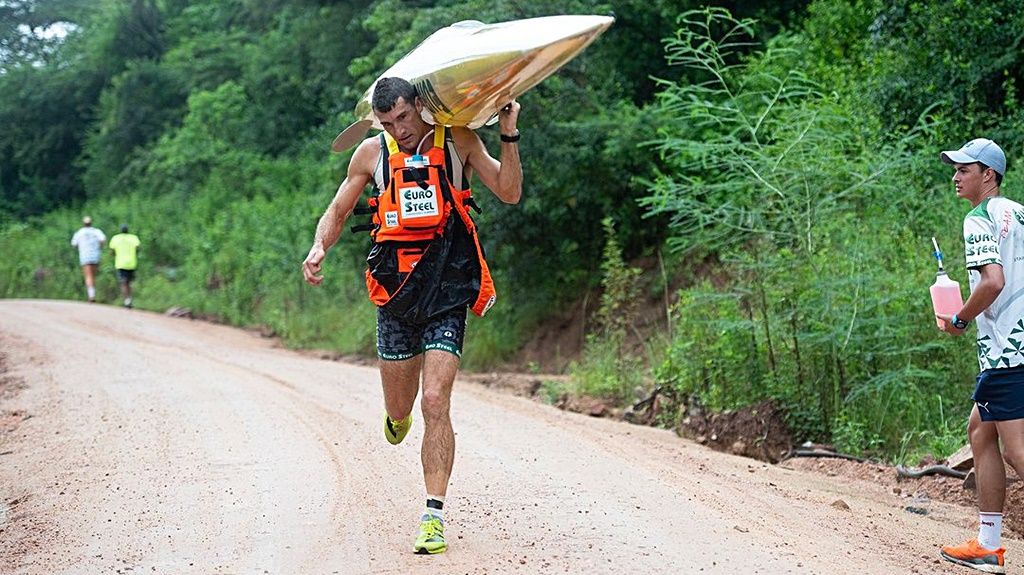 The Dusi Canoe Marathon could be described as an extreme canoeing and running biathlon, and Andy Birkett's outstanding paddling has been well supported by his excellence when portaging the tough Dusi route. (https://dusi.co.za/)