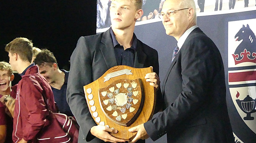 Westville Boys' High Headmaster Graham Steele was able to present the Nestor Pierides Memorial Trophy to his school at the conclusion of the evening's action. (Photo: Brad Morgan)