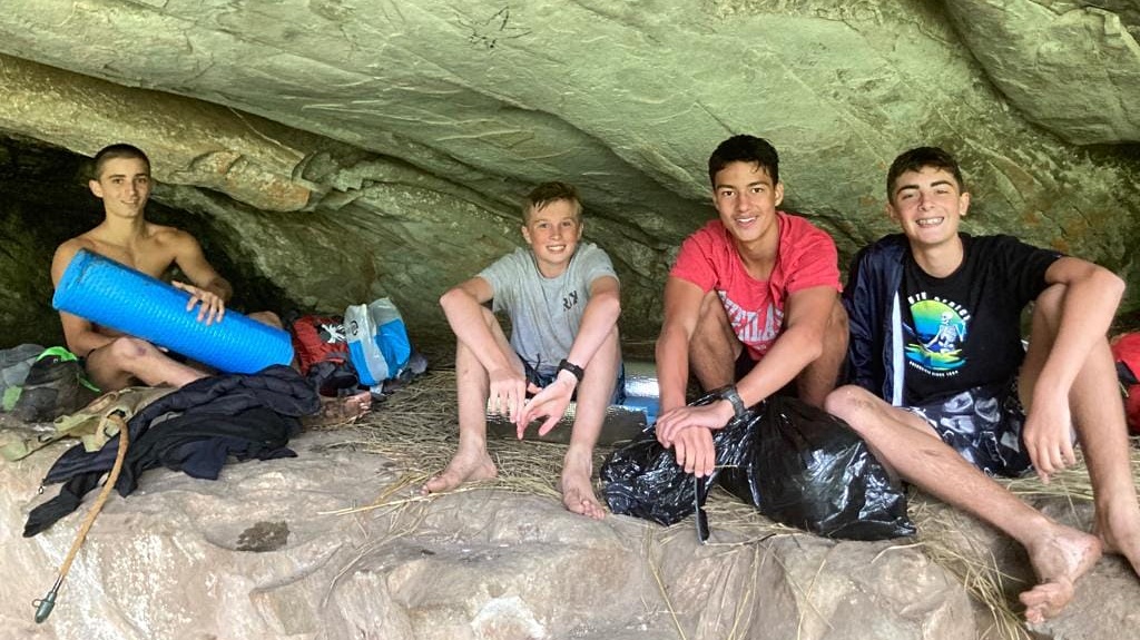 Dry and protected, the Northwood boys enjoyed the experience of sleeping in a cave.