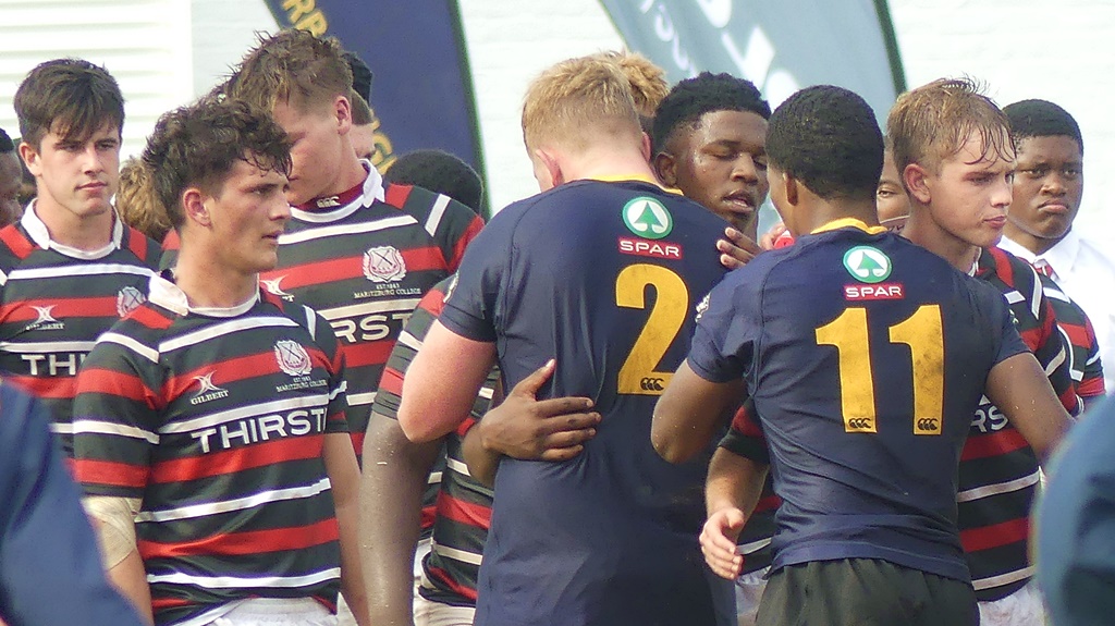 DHS captain Christian Everitt leads his team to thank Maritzburg College for their playing part in a fantastic battle. (Photo: Brad Morgan)