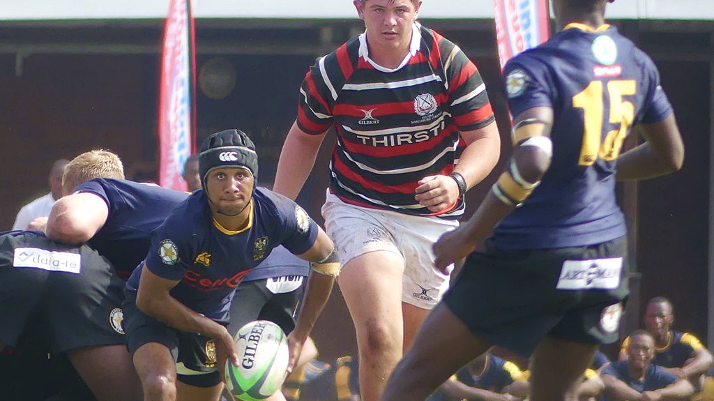 Scrumhalf Florenson Ockhuis gets the ball away to his backline in a 14-7 win for DHS over Maritzburg College on Van Heerden's, Durban, 25 March 2023. (Photo: Brad Morgan)