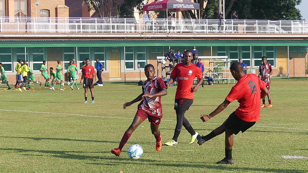 Philasande Khuzwayo slides home Maritzburg College's final goal in their 4-0 win over Newton. (Photo: Brad Morgan)