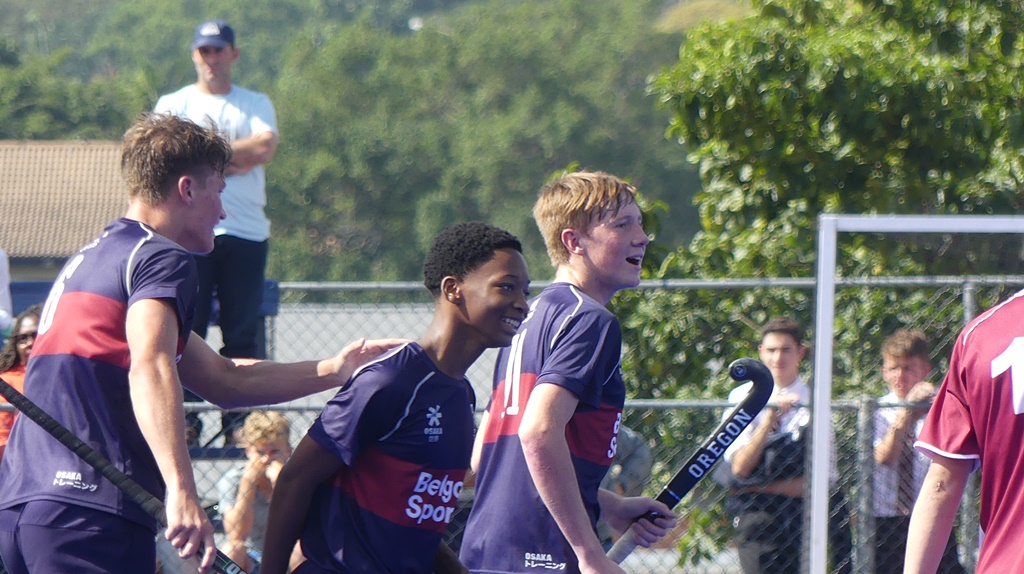 Sibusiso Cele is congratulated by his team-mates after equalising for Westville. (Photo: Brad Morgan)