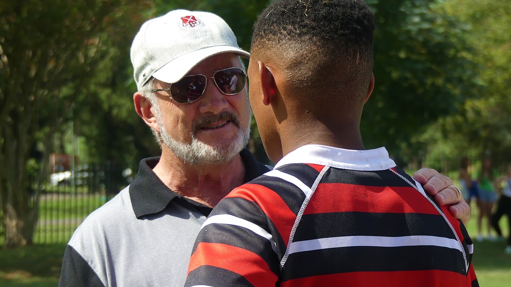 Maritzburg College Headmaster Chris Luman gives on of the College under-14 A players a pat on the back and words of encouragement. (Photo: Brad Morgan)