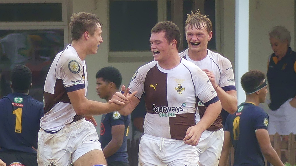 Smiles all round for Northwood as Titus Cesonis is congratulated on his try. (Photo: Brad Morgan)