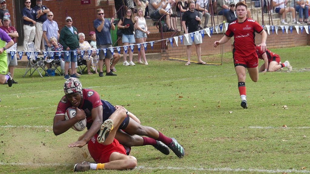 Westville centre Siyabonga Ndlozi dragged a defender over the line as he scored his second try against Hartpury College. (Photo: Brad Morgan)