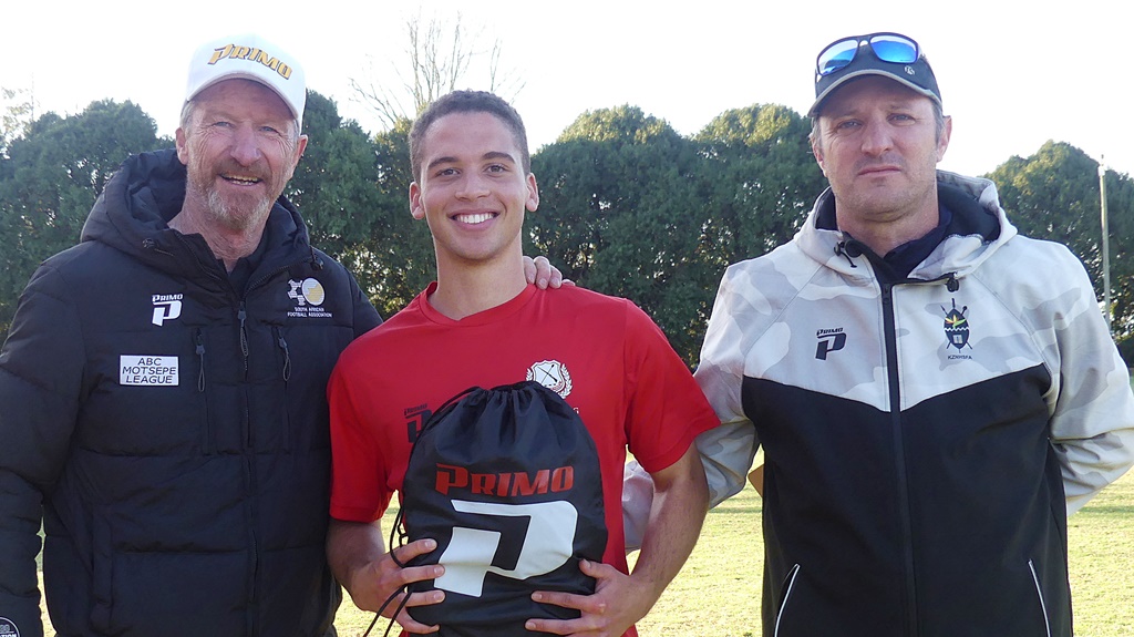 Primo Sportswear's Bobby Deutschmann and KZN High Schools Football Association Chairperson, Dan Haswell, congratulate Grayson Mentory on being named player of the final, which netted him a prize from Primo. (Photo: Brad Morgan)