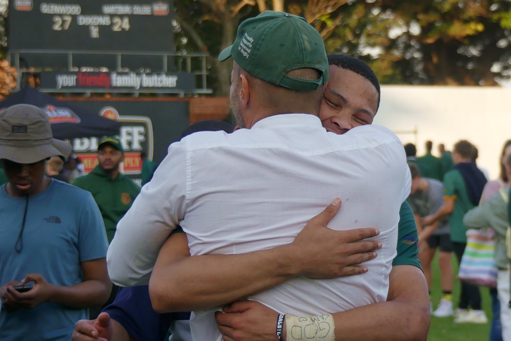 Coach Derek Heiberg and Jaco Williams, who has signed a contract with the Sharks from 2024, share a hug after a memorable victory. (Photo: Brad Morgan)