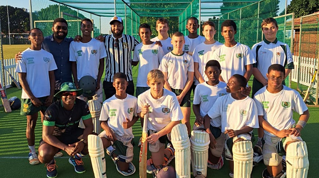 A band of brothers: Glenwood boys pad up for a net session.