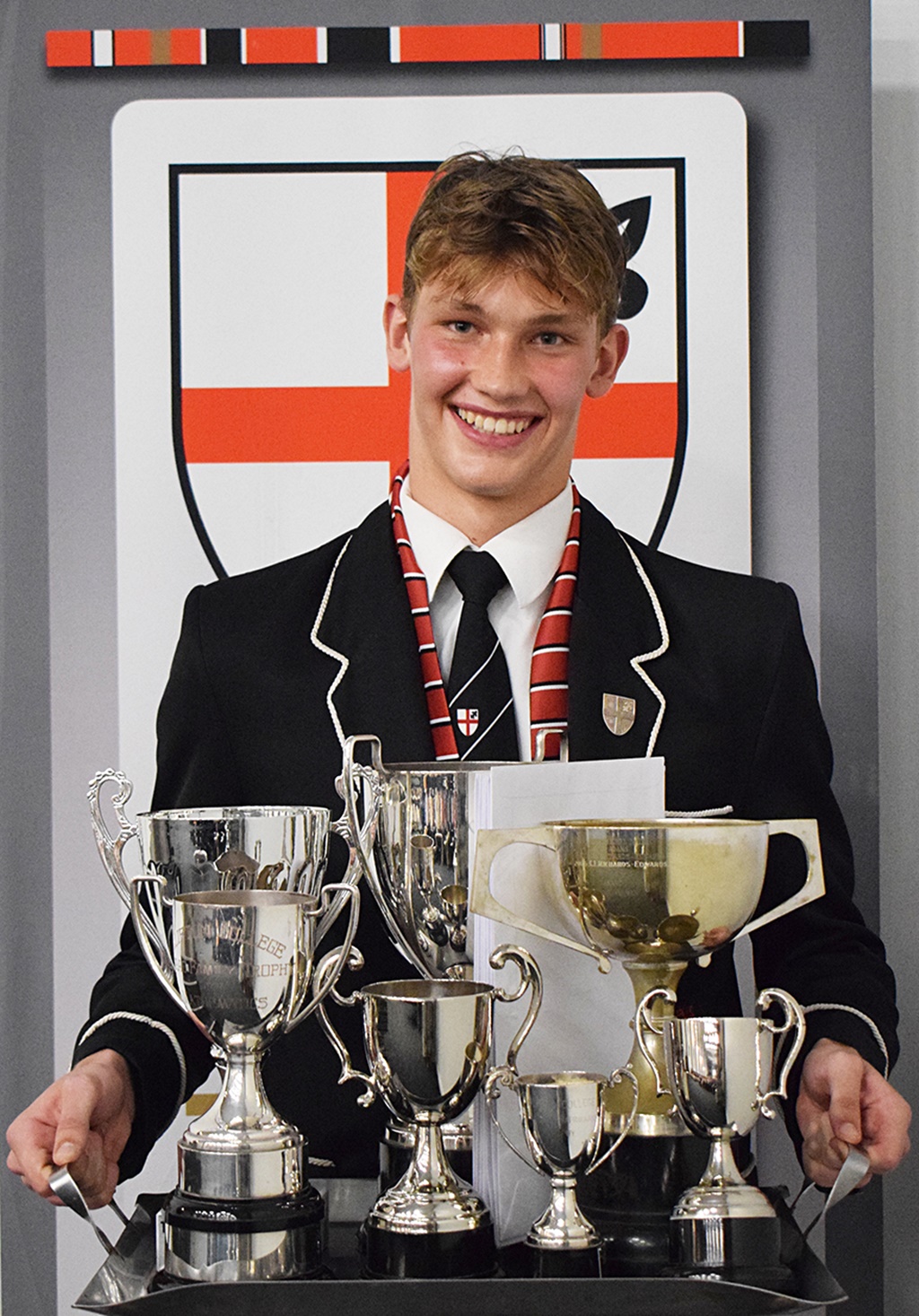 Leading by example and academic excellence ensured that David van Rooyen was weighed down by silverware after Clifton's annual prize giving.