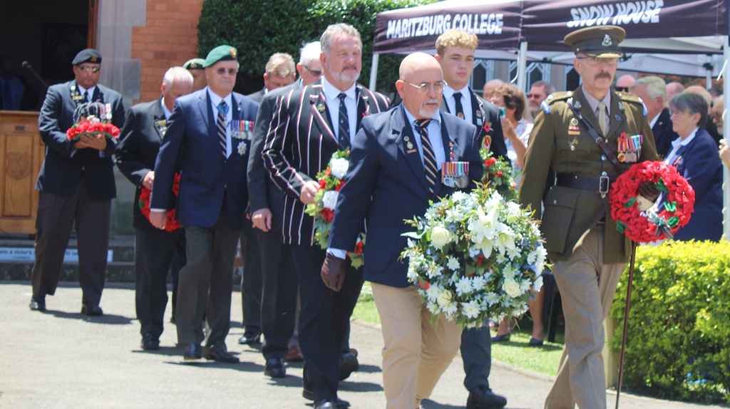 The wreath-laying party makes its way towards Maritzburg College's World War One Memorial.