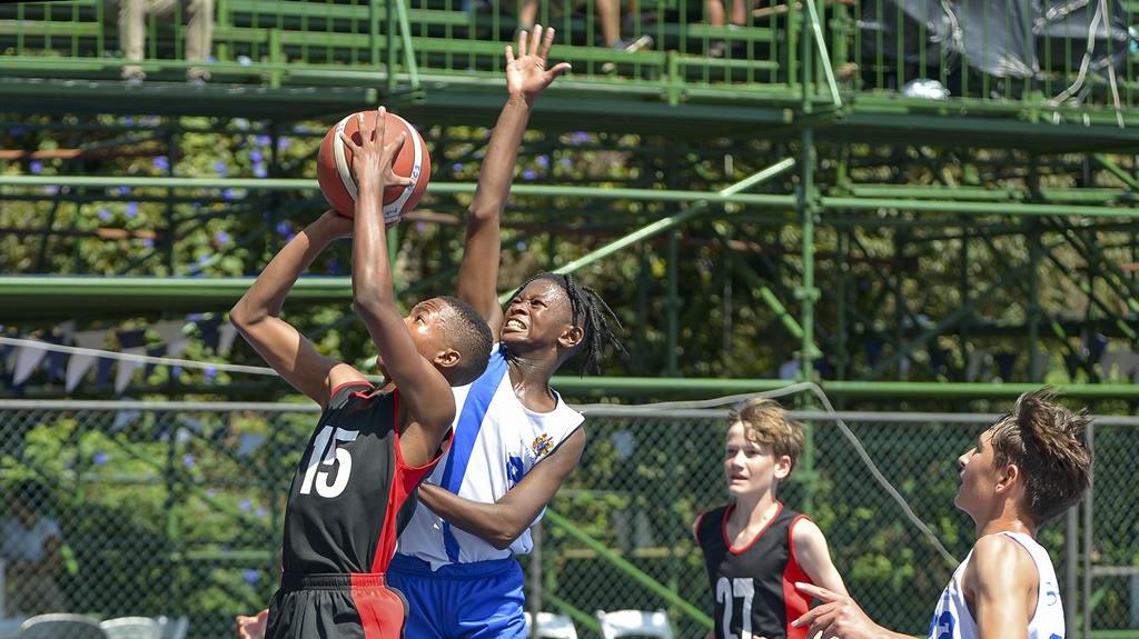 Clifton College take the ball to the basket in their convincing day two win over Saheti. (Photo: ActionPix)