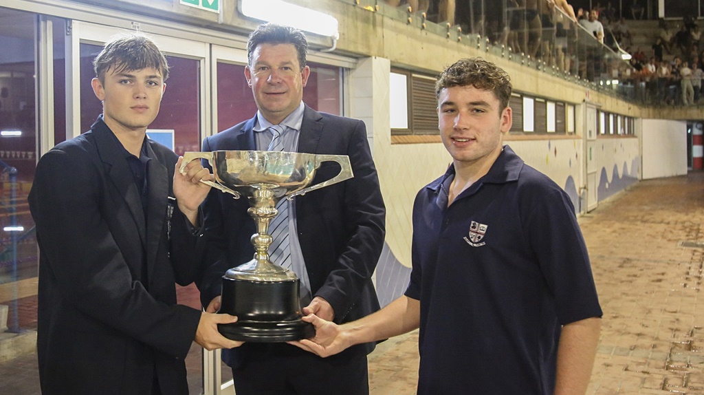 Kearsney College Headmaster Patrick Lees presents the Durban and Districts Gala Trophy to Westville Boys' High.