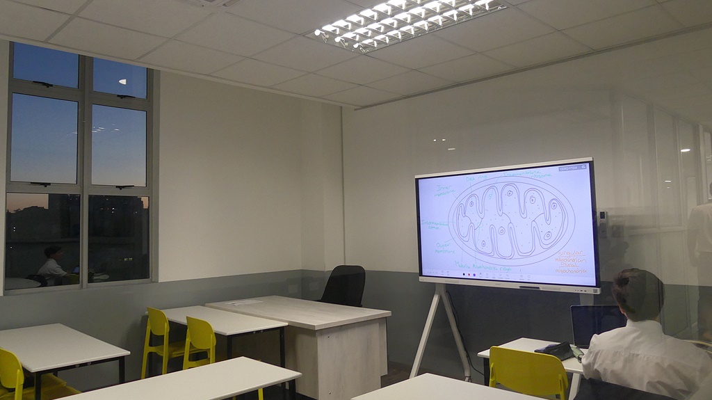 Before the Nonpareil and Cambridge Wing had been officially opened, some boys were already making use of the smartboards in the evening. (Photo: Brad Morgan)